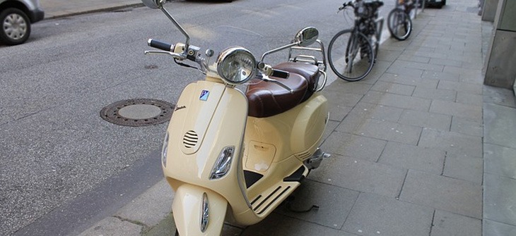 Yellow light weight motorcycle moped