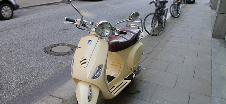 yellow moped bike
