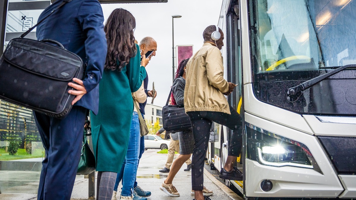 adults-boarding-a-city-bus