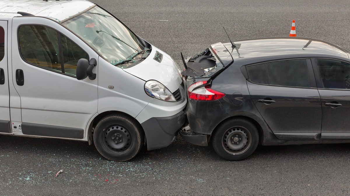 view-of-a-white-van-rear-ending-a-black-car
