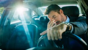 male-driver-tired-at-the-wheel