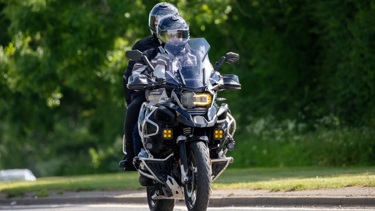 rider-on-motorcycle-with-passenger rider-on-motorcycle-with-passenger
