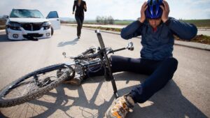 cyclist-on-the-ground-after-accident