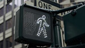 digital-walk-sign-at-intersection