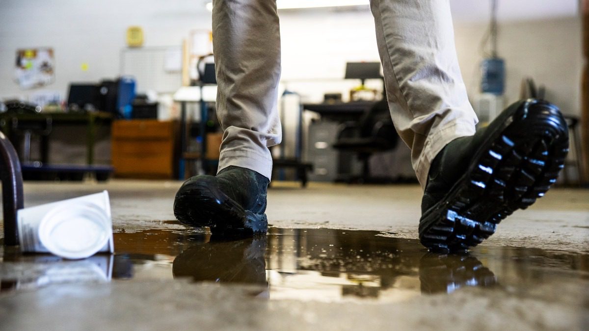 individual-about-to-slip-on-puddle-of-wet-oil