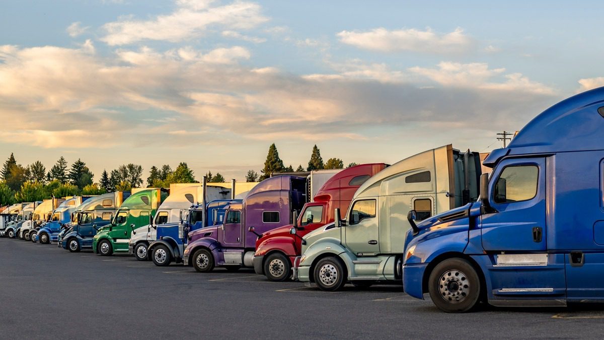 row-of-trucks-parked-at-a-rest-area