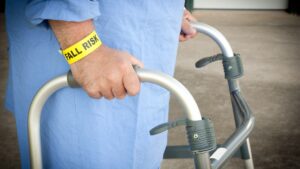 senior-using-walker-with-fall-risk-bracelet