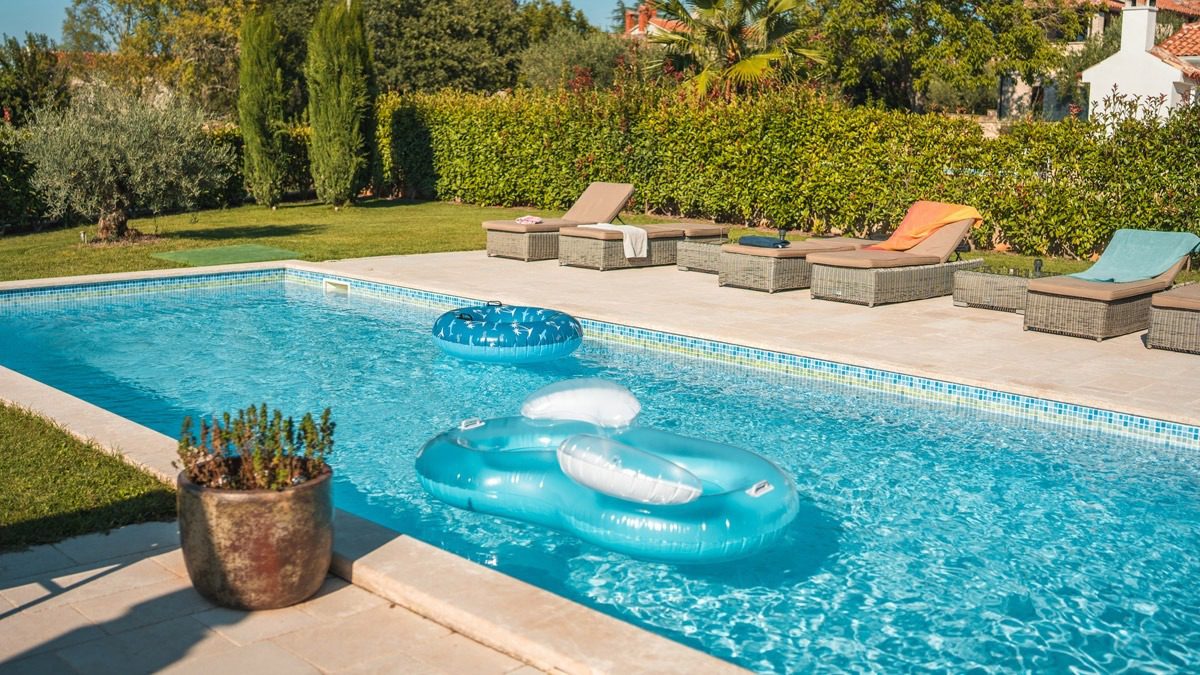 view-from-the-side-of-a-residential-inground-pool