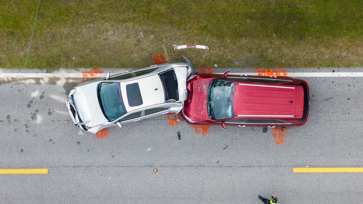 Overhead view of car crash with two vehicles