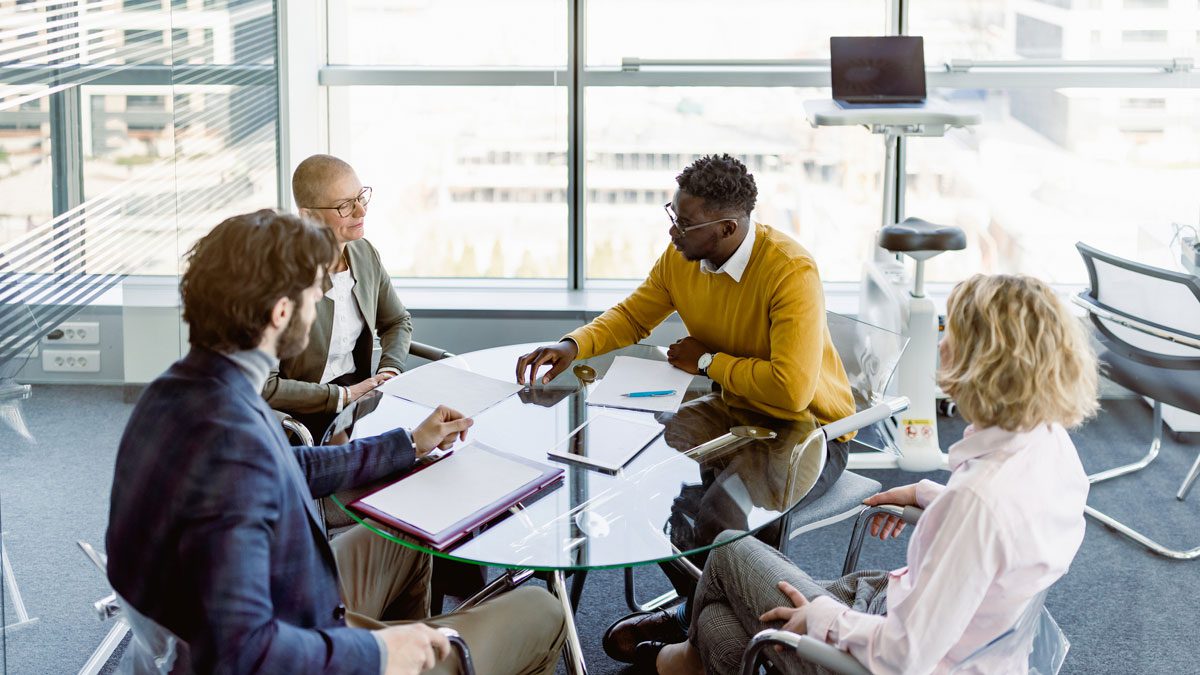 group-of-professionals-seated-around-a-table