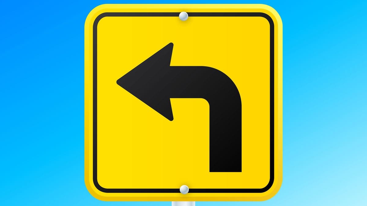left-turn-arrow-on-yellow-sign