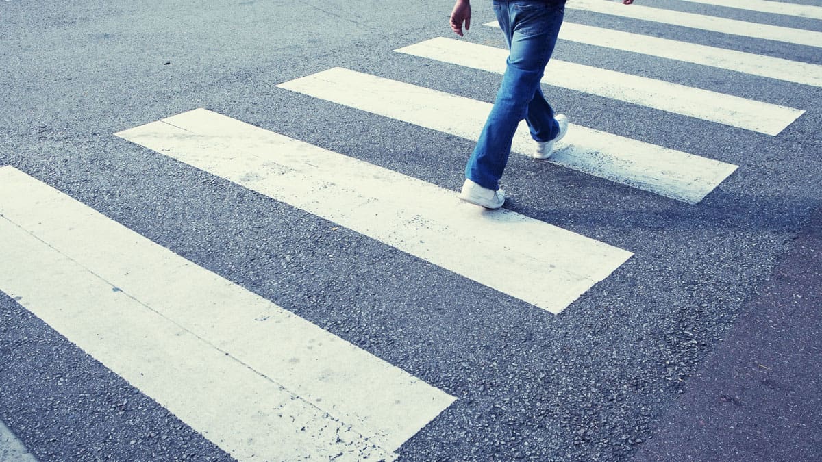 person-walking-across-crosswalk